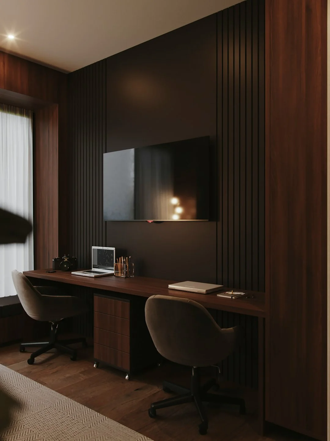 A contemporary workspace showcasing a laptop, tablet, and smartphones, ideal for tech and freelance use.